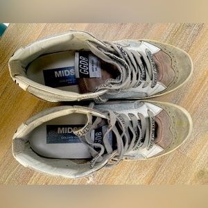 Authentic golden goose sneakers pre loved which makes them even better !!